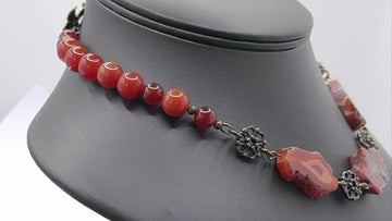 Homepage video of various necklaces, earrings, and bracelet on a rotating display.